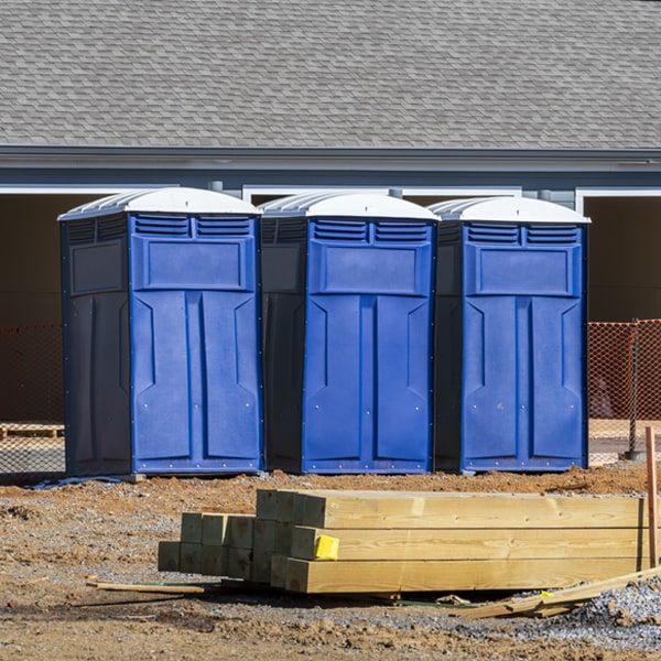 what is the cost difference between standard and deluxe porta potty rentals in Krum TX